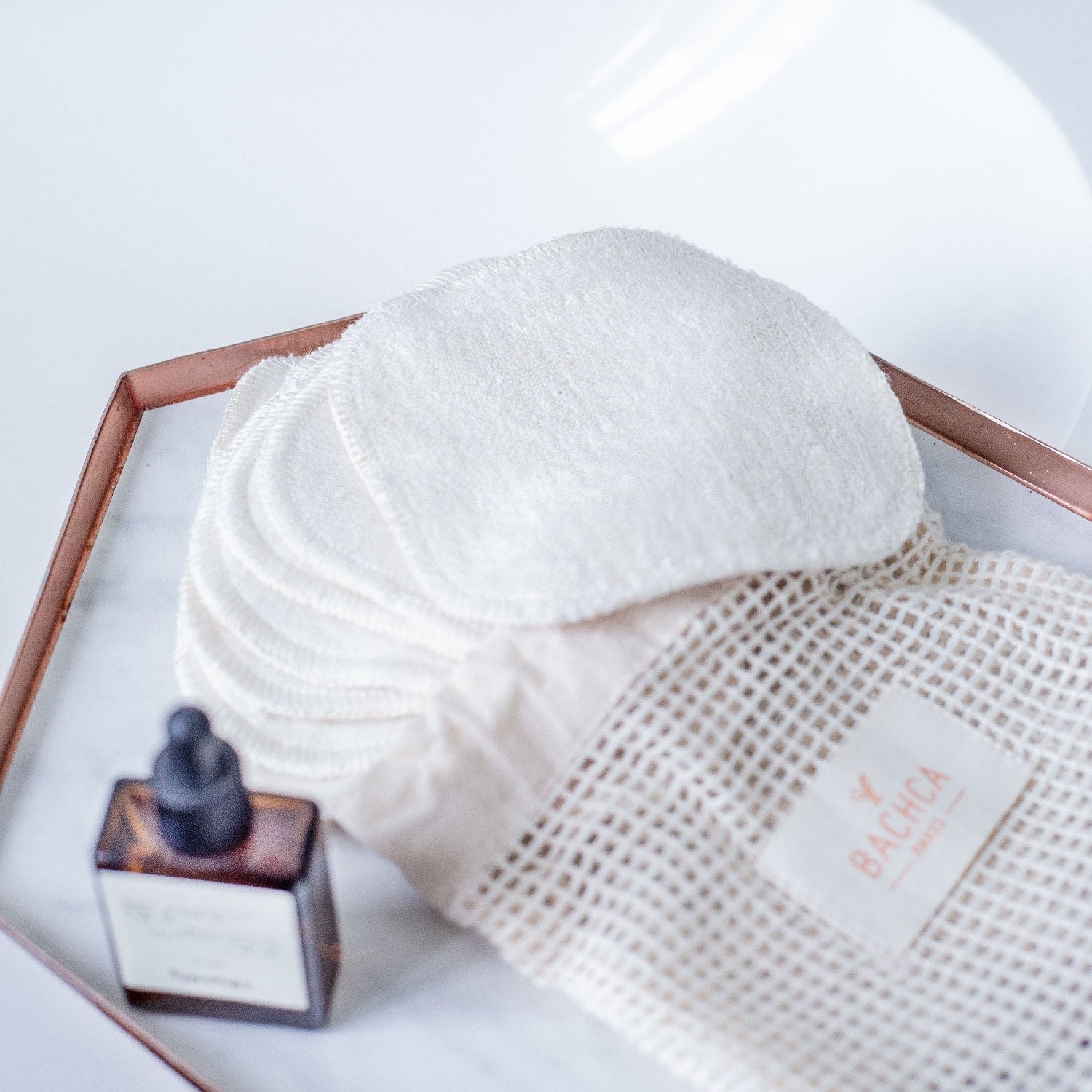 7 cotons réutilisables + filet de lavage