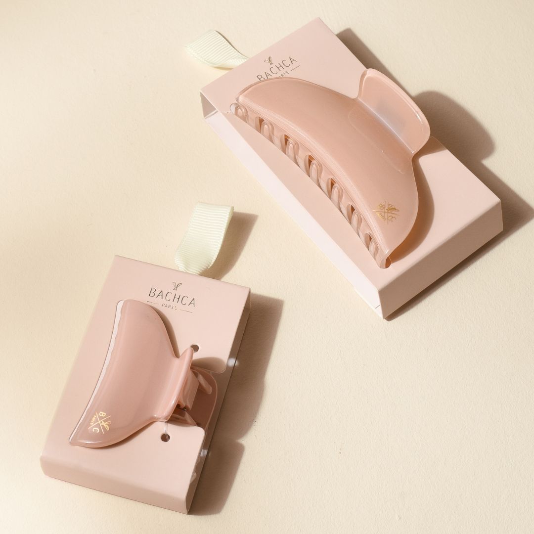 Set de grande et petite pinces à cheveux rose dragée Bachca, accessoires élégants et pratiques pour réaliser des coiffures raffinées.