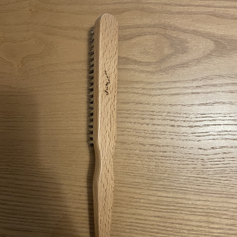 Imparfaite brosse à cheveux plaquage