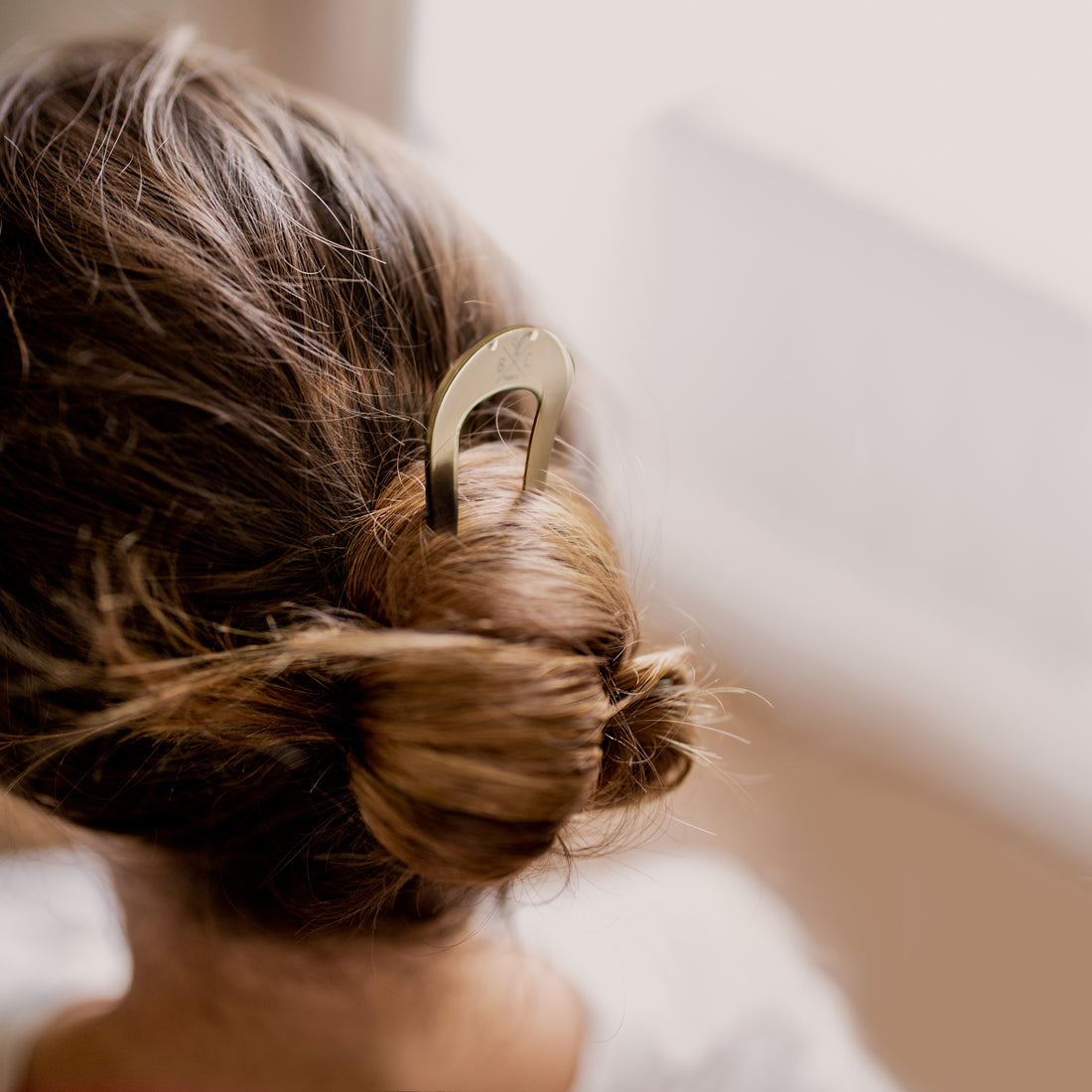 Pic à chignon doré