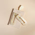 Duo de barrettes rectangle Bachca en acétate de cellulose effet nacré, présenté sur son emballage rose avec ruban, accessoire cheveux élégant et responsable.